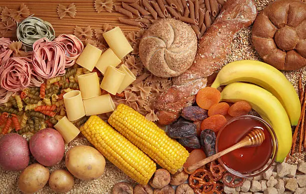 Photo of Overhead view of carbohydrate fruits and vegetables