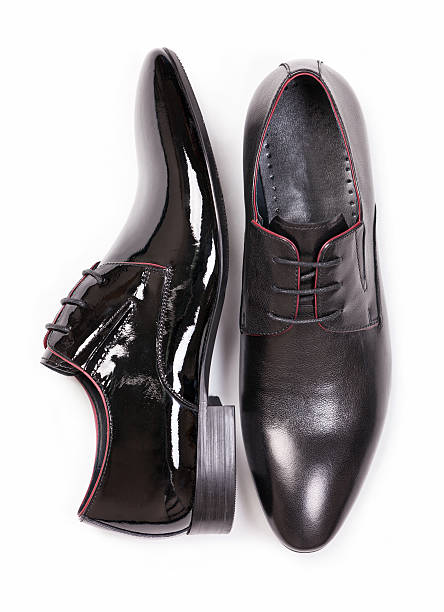 istock Two black men shoes against white background 177273722