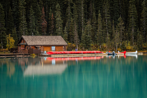 Canoes lined up at rental house, Lake Louise.