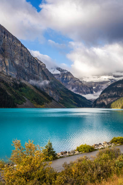 View of Lake Louise, Banff at sunrise at the tip.