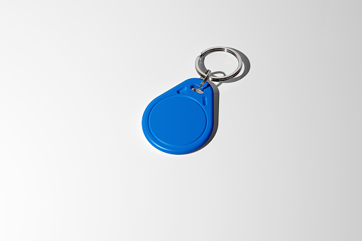 Blue key fob tag mockup. 3D rendering