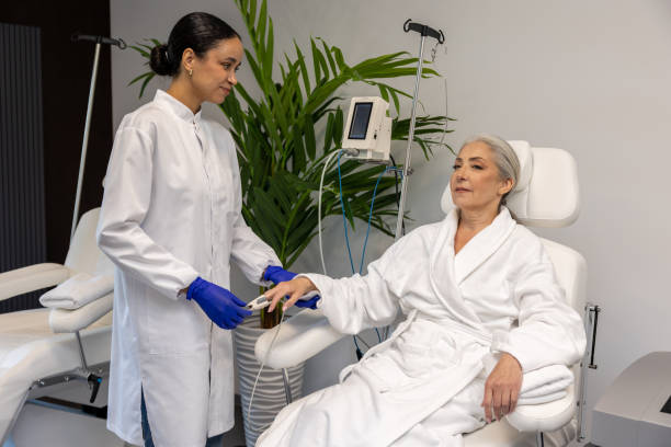 istock Nurse checking oxygen level through oximeter for senior female patient. 1772781380