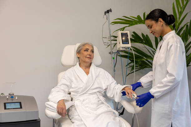istock Nurse checking oxygen level through oximeter for senior female patient. 1772781394