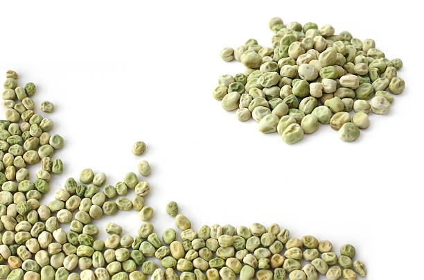 Dry green peas on a white background
