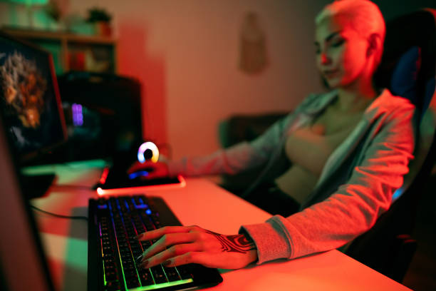 istock Young Caucasian female gamer playing strategy video games on computer 1772805099