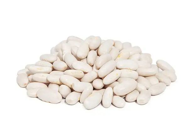 "Pile Great Northern Beans isolated on white background. Also called white kidney beans, these beans have a smooth texture, and delicate flavor."