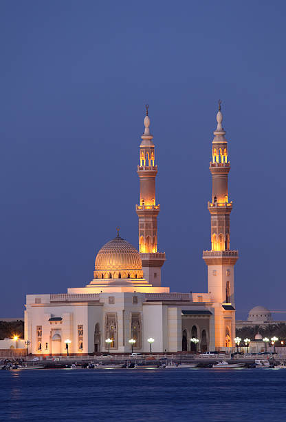 Mosque in Sharjah illuminated at dusk