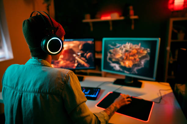 istock Unrecognizable young Caucasian female gamer playing strategy video games on computer 1772815373
