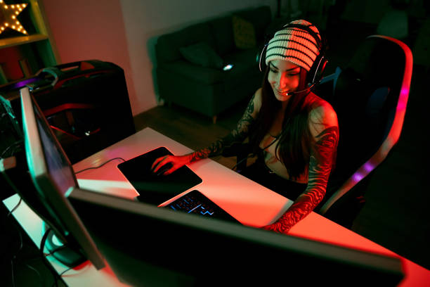 istock Young Caucasian female gamer playing video games on computer 1772816769