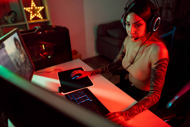 istock Female gamer playing multiplayer video games on computer 1772816795