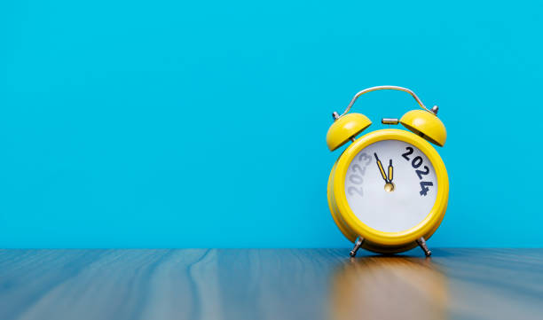 istock Number 2024 and 2023 on clock face 1772818426