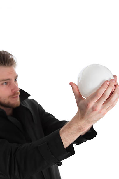 istock Man looking up into a glass ball 177283250