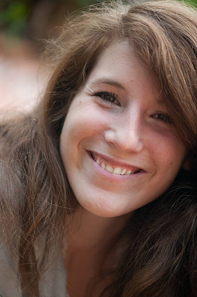 istock Smiling Teen Looks Directly in Camera 177283515