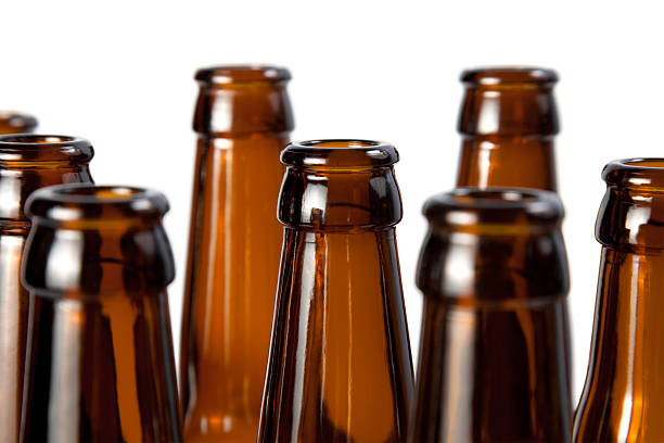 The necks of beer bottles brown glass stock photo