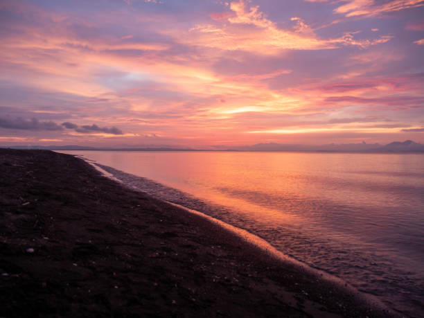 istock Wild empty beach at dusk under a majestic sunset light 1772837984