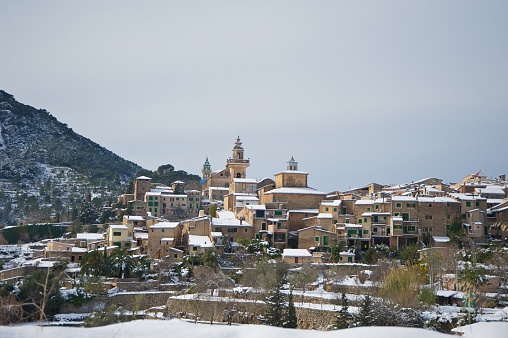 In this picture you can see a panoramic view of Valldemossa, a beautiful town in the heart of Majorca. This picture was taken after a big snowy day. It's very unusual to see snow in Majorca.