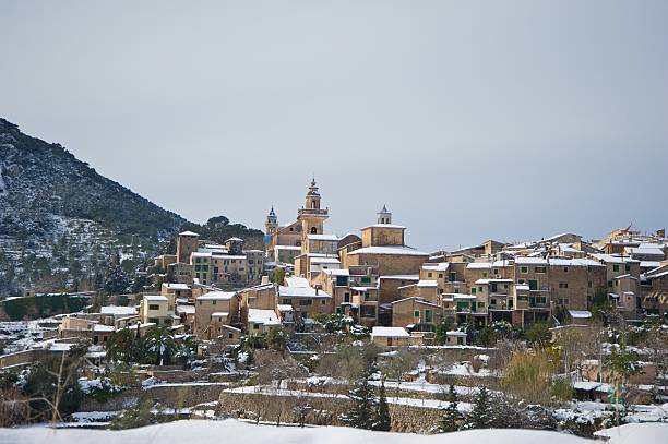 Snow in Majorca In this picture you can see a panoramic view of Valldemossa, a beautiful town in the heart of Majorca. This picture was taken after a big snowy day. It's very unusual to see snow in Majorca. banyalbufar stock pictures, royalty-free photos & images