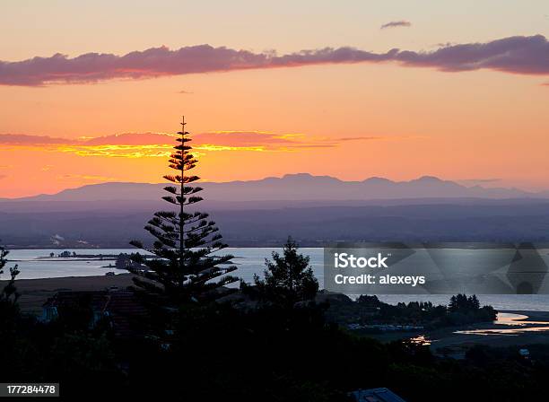 Sunset Over Bay Stock Photo - Download Image Now - Bay of Water, City, Cloud - Sky