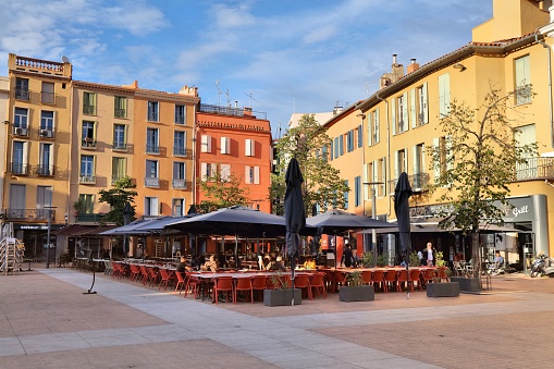 People visit main square Place de la Republique in the prefecture town of Perpignan in Southern France.