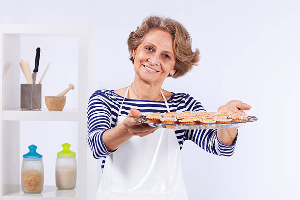 istock Senior woman cooking 177284679