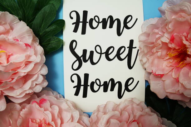 istock Home Sweet Home typography text with peony flowers on blue background 1772847966