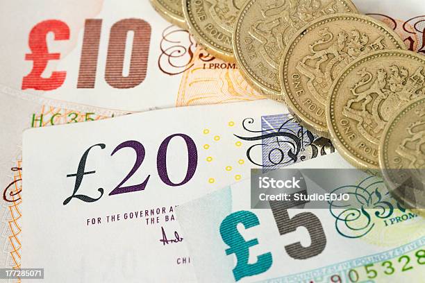 Uk Bonknotes And One Pound Coins Stock Photo - Download Image Now - British Pound Note, British Culture, British Currency