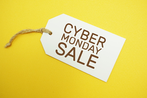 Cyber Monday Sale tag on yellow background