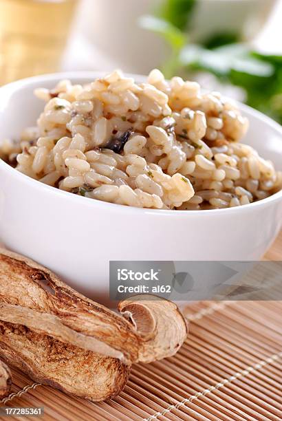 Risotto With Porcini Mushrooms Stock Photo - Download Image Now - Cooking, Cultures, Dinner