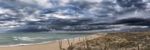 Photo of the vermilion coast under a stormy sky