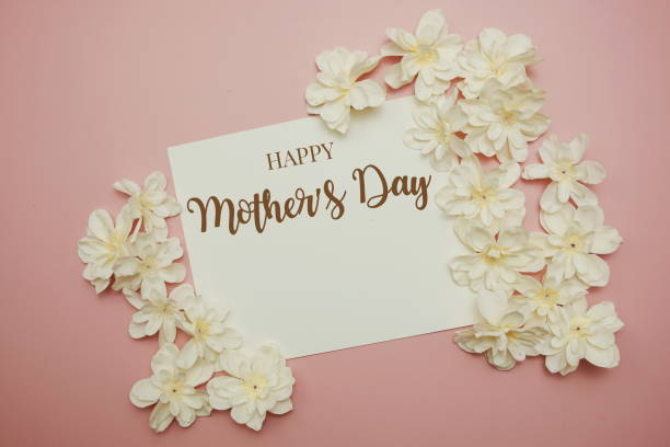istock Happy Mother's Day card typography text with flower on pink background 1772881449