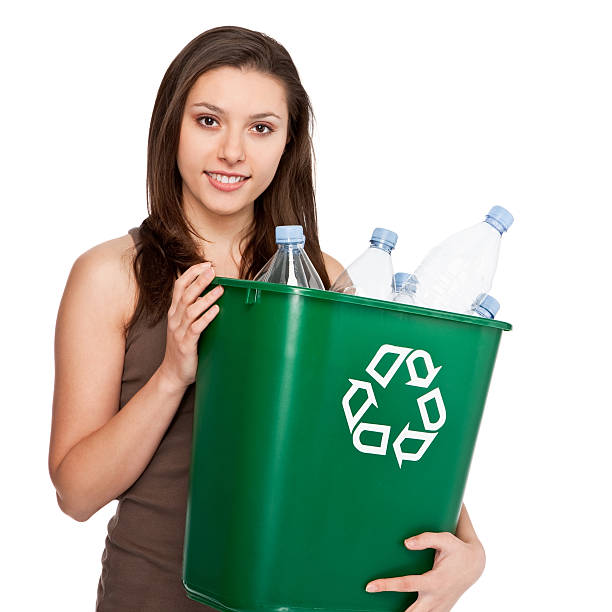 istock Cute young girl holding recycling bin 177289141
