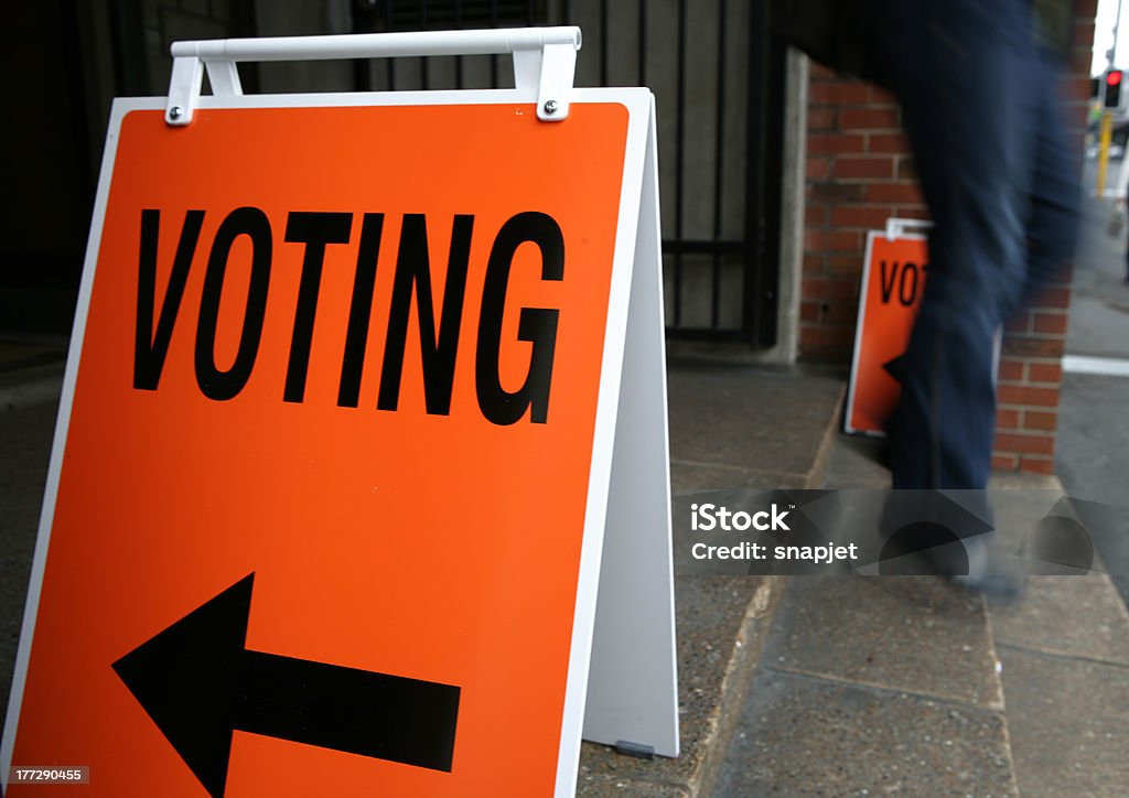Walking out from polling facility on election day Polling Booths on Election Day Voting Booth Stock Photo