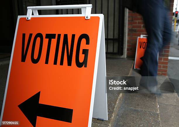 Walking Out From Polling Facility On Election Day Stock Photo - Download Image Now - Voting Booth, Leaving, Building Entrance