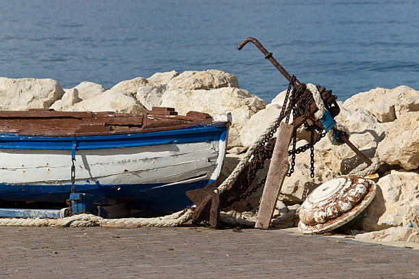 istock Old wooden boat and rusty anchor 177290518
