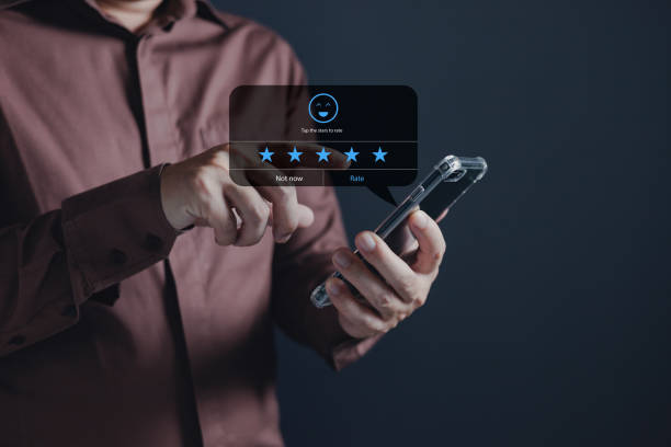istock a businessman using application on smartphone the virtual screen to give satisfaction in service.rating star very impressed.customer service and satisfaction concept. 1772905747