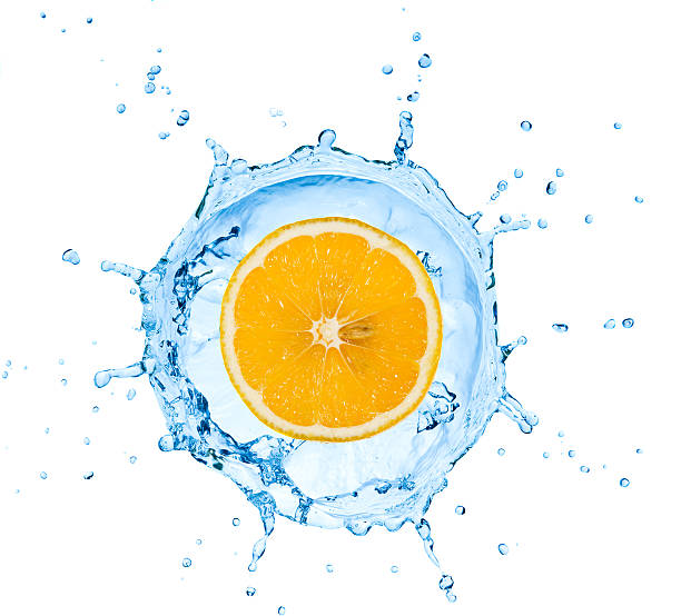 istock segment of lemon falling in to the water 177290902