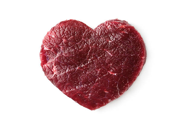 cuore di carne isolato su sfondo bianco - meat beef love heart shape foto e immagini stock