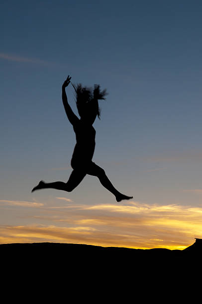 istock Jumping dancing woman silhouette 177291145