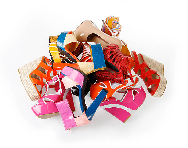istock pile of shoes on white background 177291516