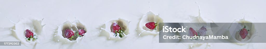 Bulking strawberries and milk Panoramic view of  strawberries bulking at milk Clean Stock Photo