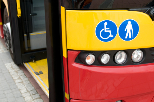 public bus on bus stop with enrtance for disabled and old people