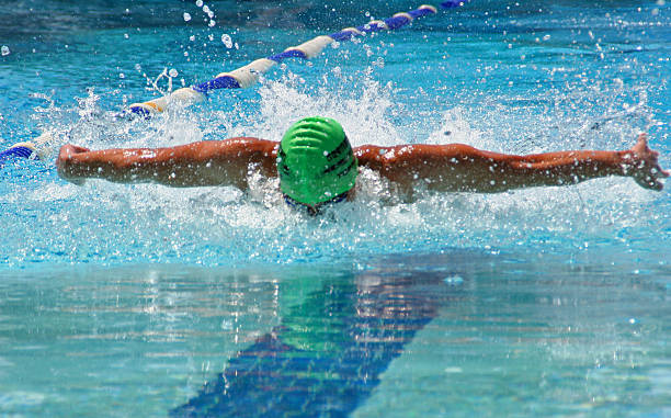 mariposa nadador - lap pool fotos fotografías e imágenes de stock