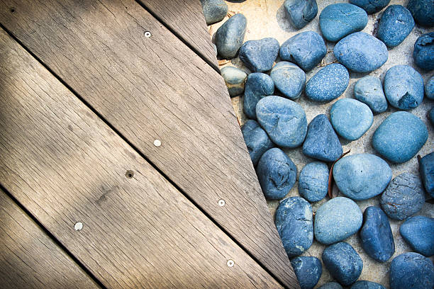istock blue stones wooden boards background 177292875