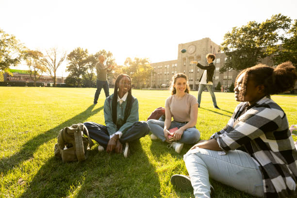 istock University students passing a football 1772929425