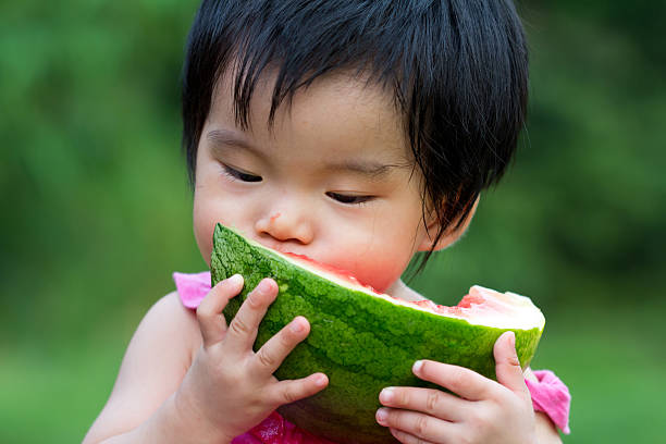 istock Baby eating watermelon 177293516