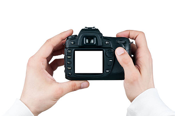 istock Digital camera in man hand, Taking photo  isolated on white 177294082