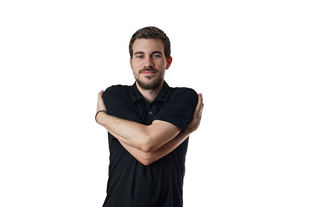 istock Young man with arms wrapped around himself 177294339