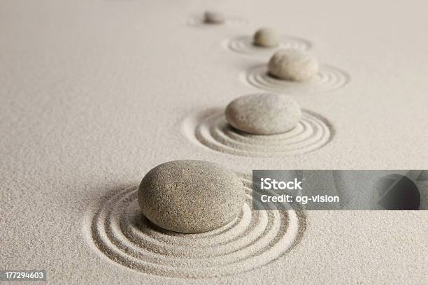Stones In White Stand With Circles Around Them Stock Photo - Download Image Now - Japanese Rock Garden, Zen-like, Sand