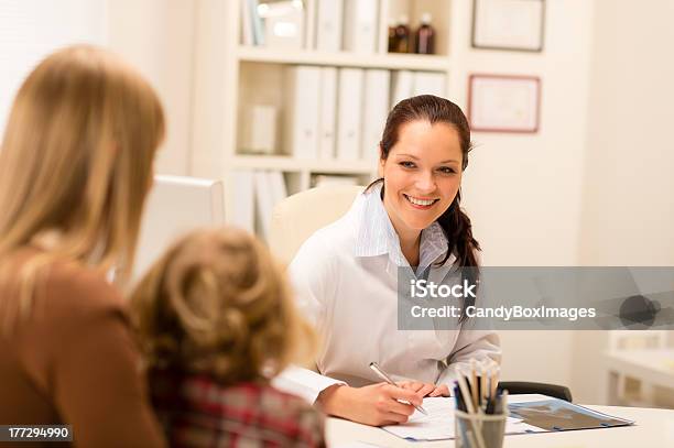 Mother And Child Girl Visit Pediatrician Office Stock Photo - Download Image Now - Adult, Cheerful, Child