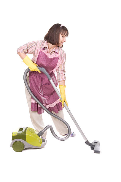 istock woman with vacuum 177295050